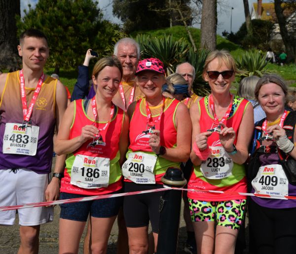 CHC Finishers with medals Run Falmouth Half Marathon