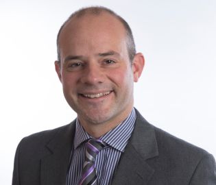 Trustee Anthony Bassett